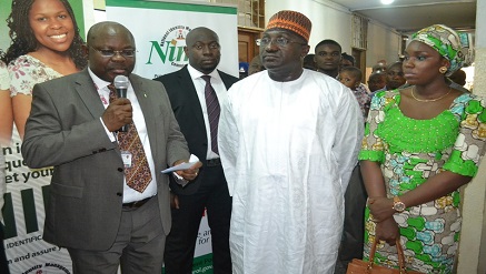 (L-r): Barrister Chris ‘E Onyemenam, director general/CEO, Mr Mike Omeri, director general, National Orientation Agency (NOA), and Mrs. Amina Mike Omeri, at the Flag off Ceremony of the National Identification Number (NIN) Enrolment Center at the NOA Headquarters in  Abuja, recently.